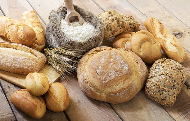 Different bread and bread slices. stock photo