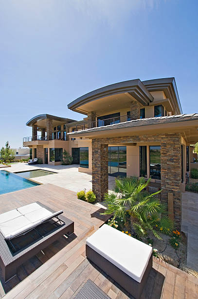 istock House And Lounge Chairs By Poolside 477767493