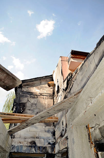 detail view of a burnt-out building After a fire, detail view of a burnt-out building, view of a building smash alarm clock stock pictures, royalty-free photos & images