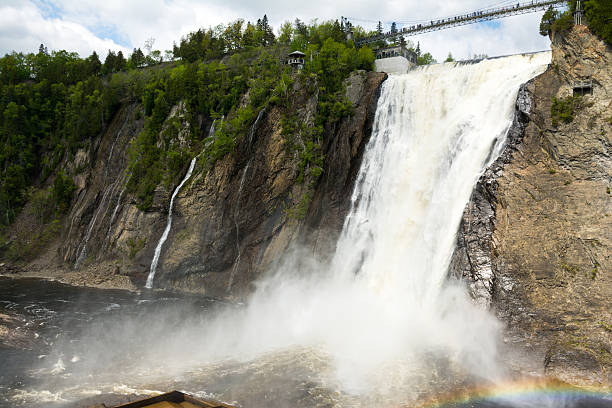 istock Rainbow at the Montmorency Falls, Quebec, Canada 477770250