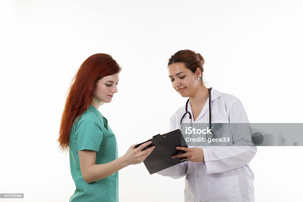Doctor & Nurse doctors and nurses working in the hospital A Helping Hand Stock Photo