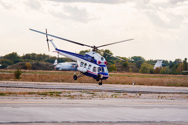 istock Helicopter taking off from the small airfield 477772329