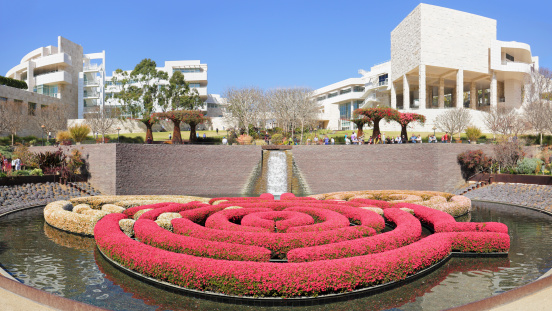 Los Angeles, USA - February 23, 2014: Visitors to the Getty Center enjoying its gardens. Located in Brentwood, the Getty Center was opened in 1997. In addition to its art collection, the center is known for its architecture and gardens.