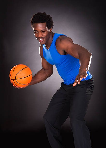 istock African Man Carrying Basketball 477773204