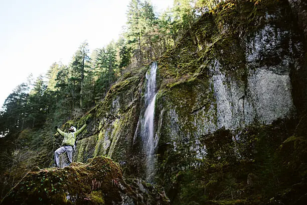 Photo of Hiker Looking Over Ravine