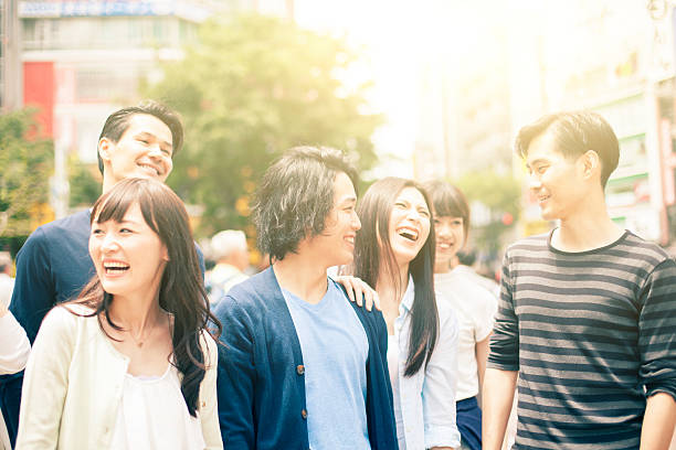 istock Young people  hanging out against cityscape 477777328
