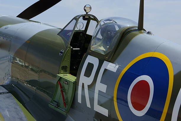 WWII Spitfire Airplane Cockpit Chino, California,USA- May 2,2015. Vintage WWII Spitfire airplane cockpit at 2015 Planes of Fame Air Show in Chino, California. The 2015 Planes of Fame Air Show features 3 days of vintage and modern military aircraft performing and many static aircraft displays open to the public. spitfire stock pictures, royalty-free photos & images