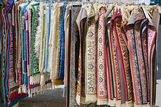 istock small various carpets in market, Greece 477778266
