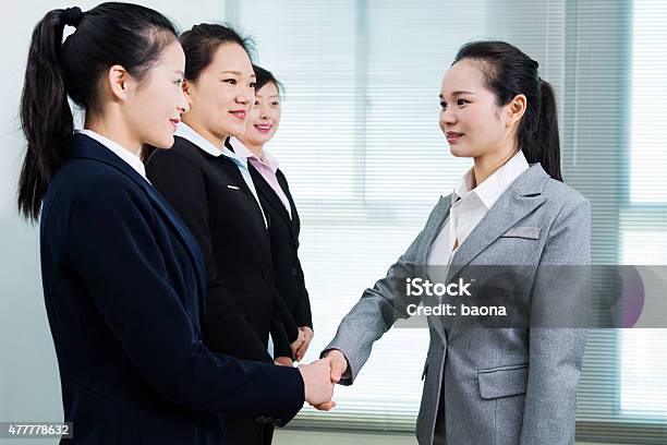 Businesswomen Shaking Hands Stock Photo - Download Image Now - 2015, Adult, Agreement