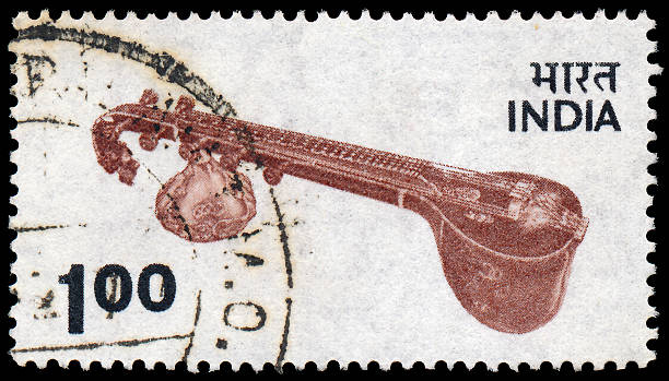 INDIA - CIRCA 1974: A stamp printed in India, shows Veena - plucked string instrument used in Hindustani classical music, circa 1974