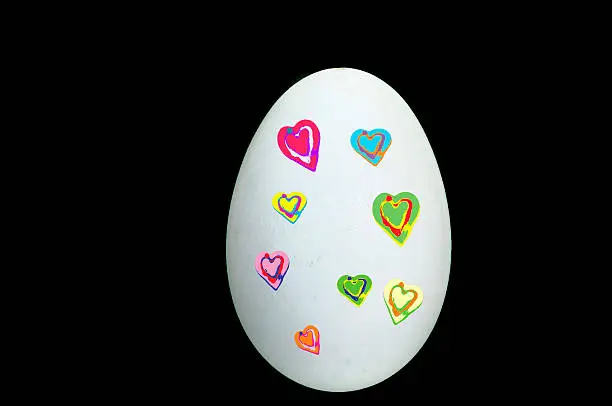 Easter egg painted with colorful hearts Freisteller