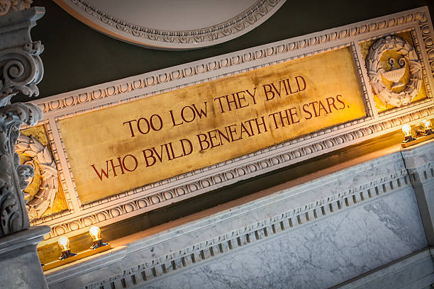 Inspirational Quote in Library of Congress "Too low they build who build beneath the stars": quote above window inside Library of Congress library of congress stock pictures, royalty-free photos & images