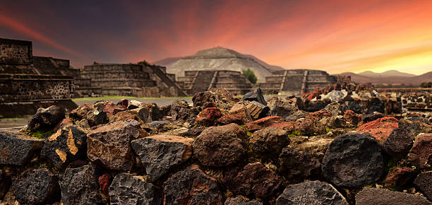 Sunset ruins ancient Mayan city of Teotihuacan Sunset over the mystical ruins of the ancient Mayan city of Teotihuacan.panoramic view kukulkan pyramid photos stock pictures, royalty-free photos & images