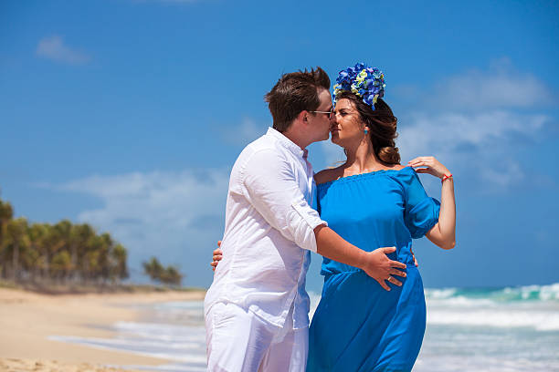 istock Beach couple walking on romantic travel. 477787716