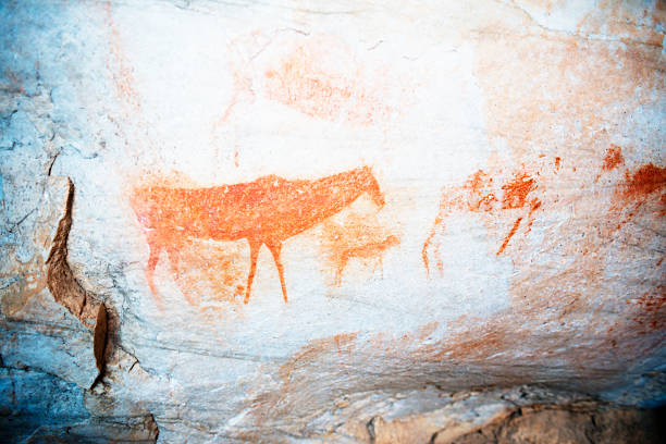 istock red paintings on rocks depicting animals 477789099