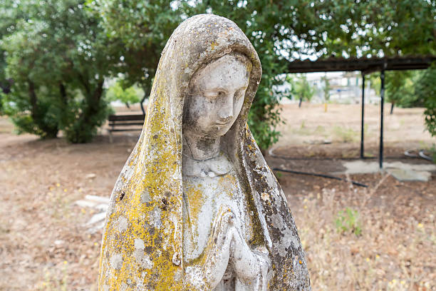 istock Stone statue of the Virgin Mary 477792866