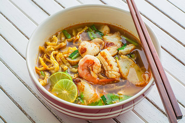 istock Tom Yam Koong and Squid soup with noodles Thai cuisine 477794844