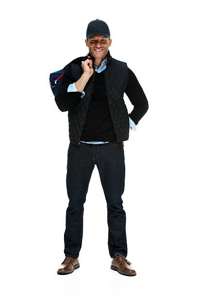 istock Happy man standing with duffle bag 477797035