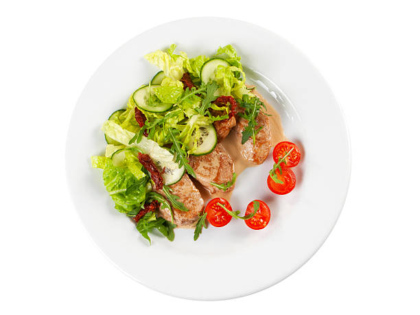 istock roasted pork steak with salad 477798131