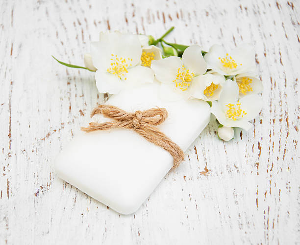 istock jasmin flowers and soap on wooden table 477799116