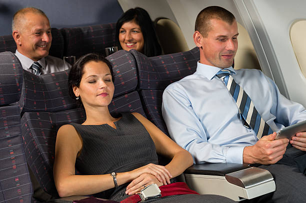 istock Airplane passenger relax during flight cabin sleep 477799187