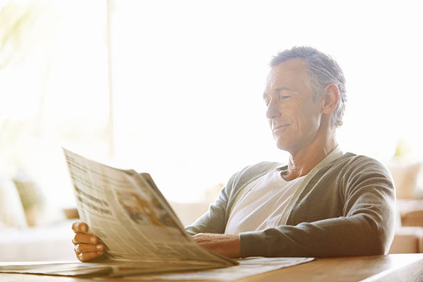 istock Reading the daily news 477803857