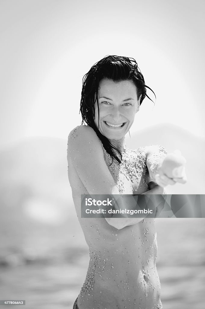 Shared Happiness Gorgeous girl posing outdoor. Selective focus. Black and white photo. Abdomen Stock Photo