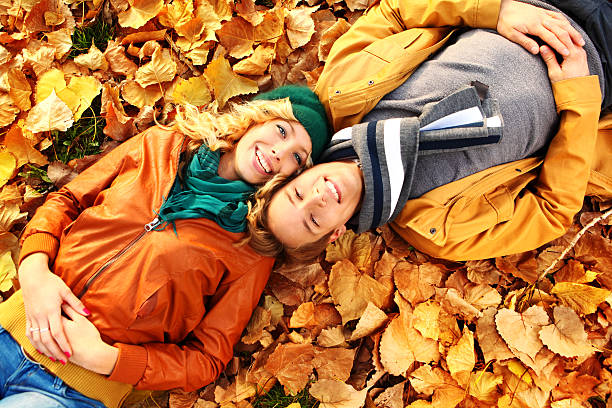 istock Smiling couple in park. 477811125