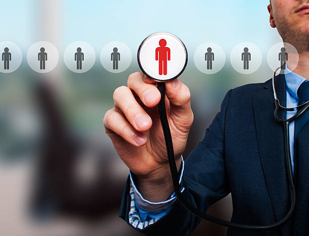 istock Businessman hand with stethoscope.Technology, internet, networking and recruitment concept. 477811378