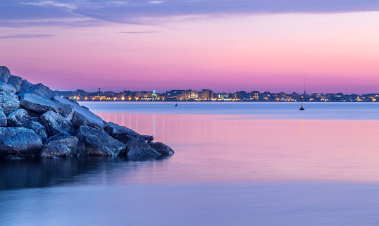 twilight at sunset on sea. Purple and light blue sky on seascape. Rimini