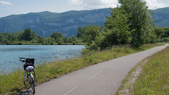 View of the future bike route ViaRhona linking Lake Geneva to the Mediterranean, passing on the section of the leisure of Brégnier-Cordon base on the side of the Savoie department.