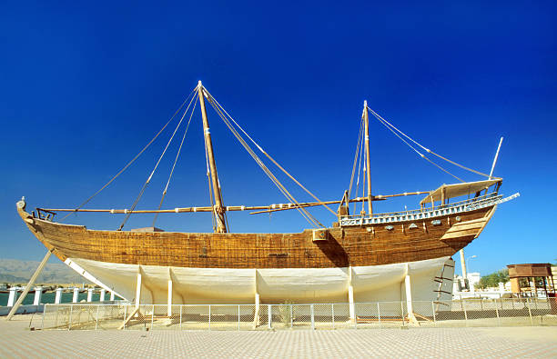 istock traditional wharft for wooden dhaus in Sur 477812285