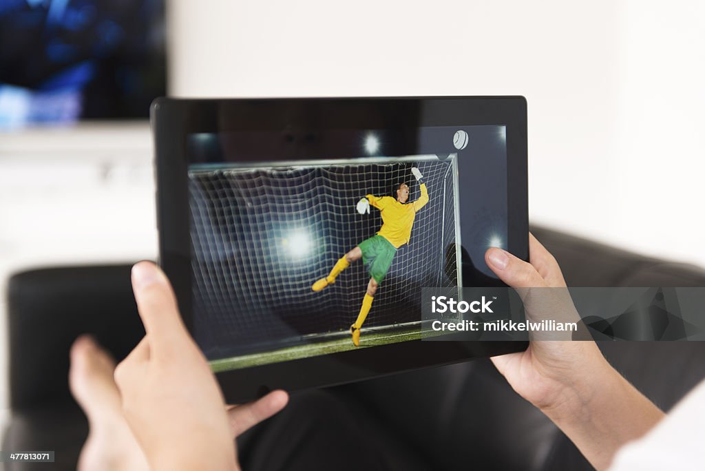 スポーツイベントの観戦に、デジタルタブレット - GUIのロイヤリティフリーストックフォト