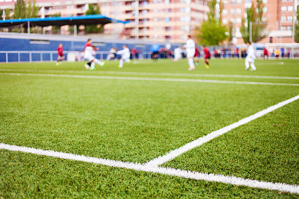 istock Soccer Field's Lines and Players 477814117