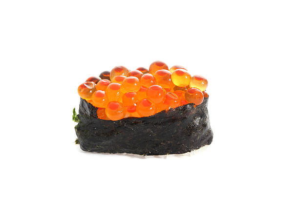 istock Salmon egg on sushi nigiri roll 477814205
