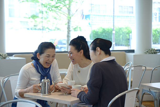 istock Japanese Senior Ladies Talking at a Cafe 477815276