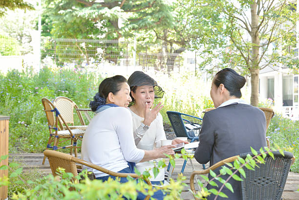 istock Japanese Senior Ladies Talking at a Cafe 477815286