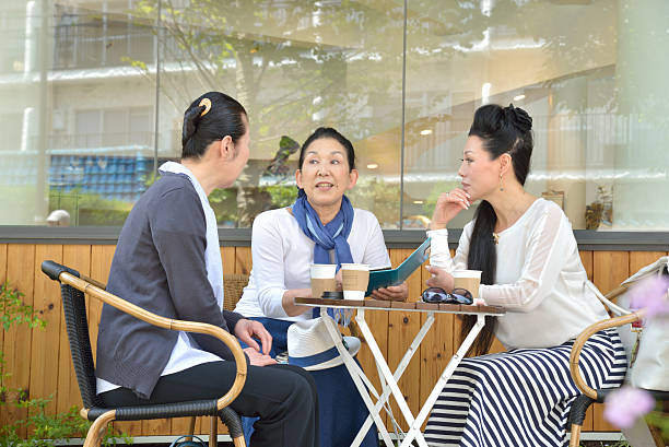 istock Japanese Senior Ladies Talking at a Cafe 477815342