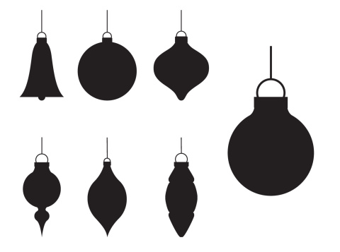 Various different styles of Christmas bauble ornaments in silhouette.