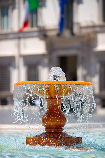 istock Orange fountain in Rome, Italy 477816861