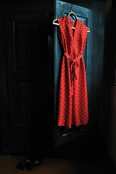 istock Mothers red dress in a white dots 477819424