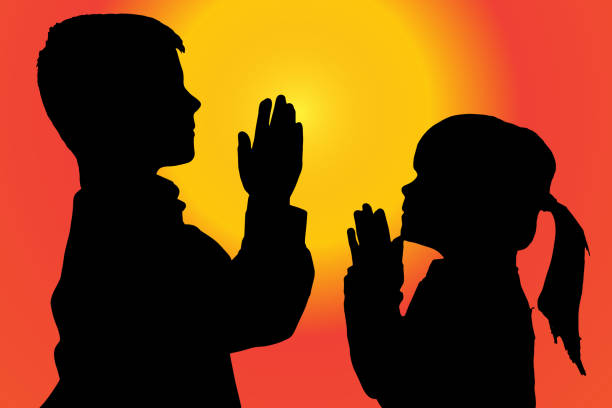 Vector silhouette of children. Vector silhouette of children who pray at sunset. church like a holy light from god stock illustrations