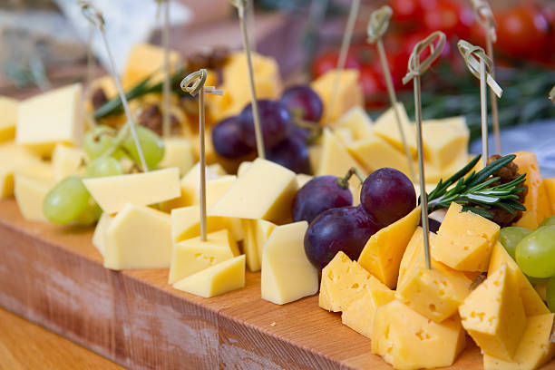 istock Cheese and grape on the wooden board 477820288