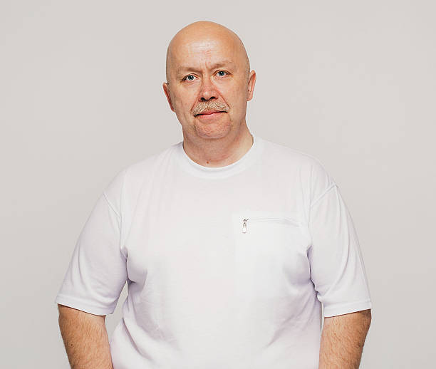 istock Senior man portrait in white white background 477823076