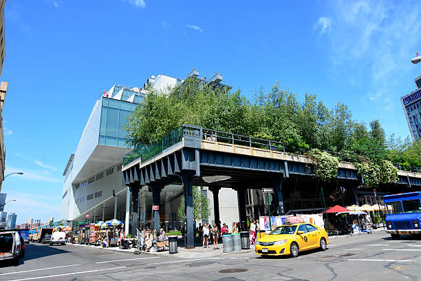 Whitney museum, High Line Manhattan on a sunny day New York, USA - June 17, 2015: Meatpacking District Cityscape, whitney museum, High Line, Hotel, Manhattan, New York City, summer day with people and traffic 21st century style stock pictures, royalty-free photos & images