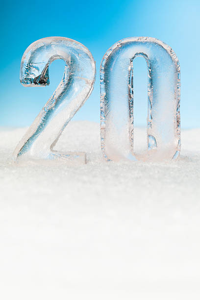 istock Number twenty ice blocks on snow background 477823911