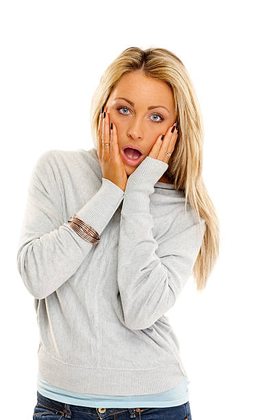 istock Pretty young girl looking shocked 477823943