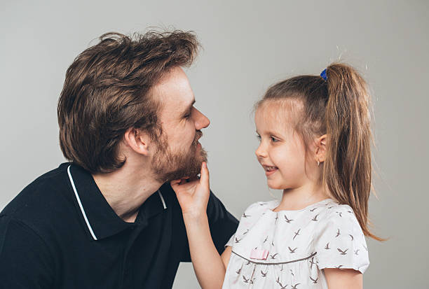 istock Father with daughter portrait studio 477823946