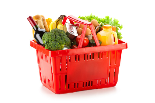Plastic Shopping Basket with Food Isolated on White Background. 