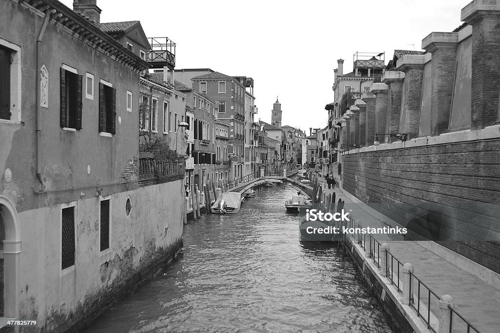 Canal in Venice Channel on the island of Dorsoduro in historic part of Venice, Italy. Black and white. Architecture Stock Photo